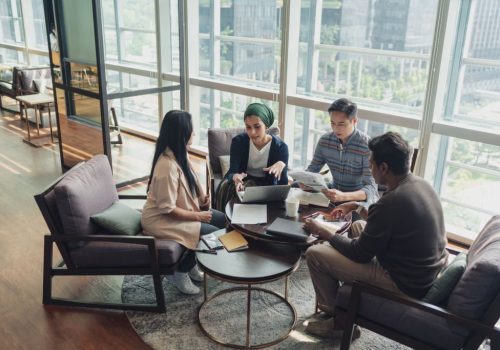 Business diversity - A multi ethnicity team in discussion